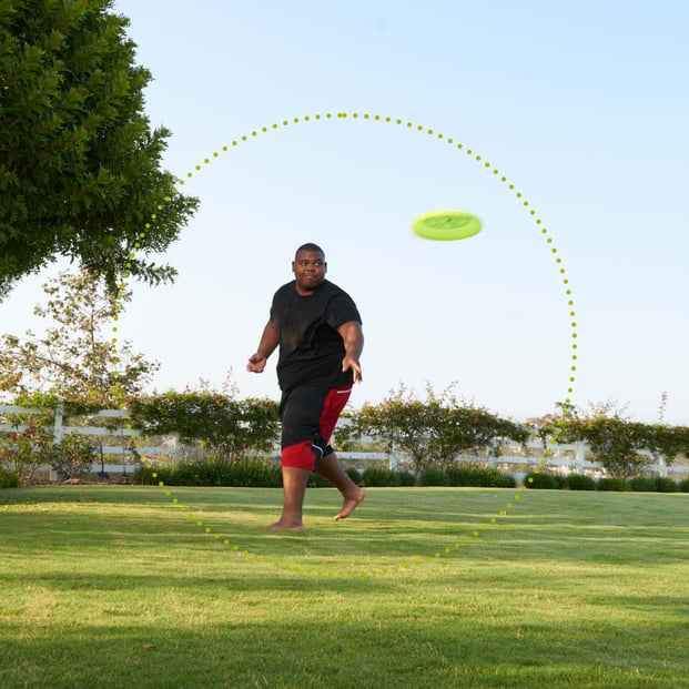 Man throwing a frisbee
